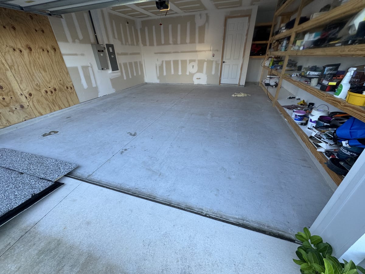 Before: Oil-Stained Garage